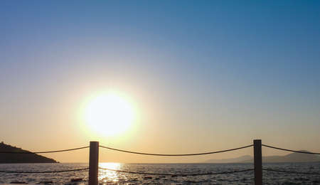 Sunset at the beach in Bodrum, Turkey Sun goes down on a summer day in Bodrum, one of the favorite destinations for local and foreign tourists.の写真素材