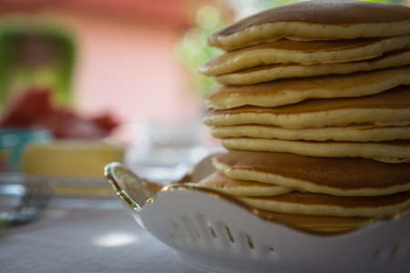 Ordinary pancakes on the table ready to be served. Close-up.