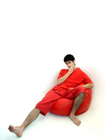 men sitting in an armchairの写真素材