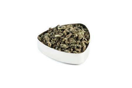 Famous "Gunpowder" chinese green tea in a metal containerの写真素材