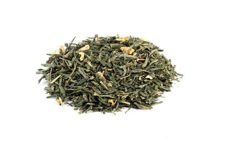Green tea blend with blossoms, orange peel and exotic flavoursの写真素材