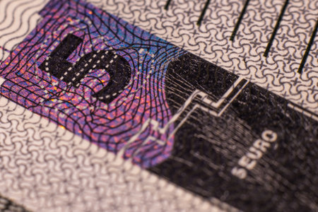Five euro banknote. Euro money macro close-up. A separate token for European Union euro cash with a face value of five euros. . Soft selective focusの写真素材