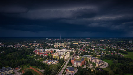 The city of Valmiera before the storm. The storm was approaching the city. Soft selective focus. An artificially created grainy pictureの写真素材