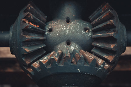 Close-up of old rusty gear, industrial background. Toned.の写真素材