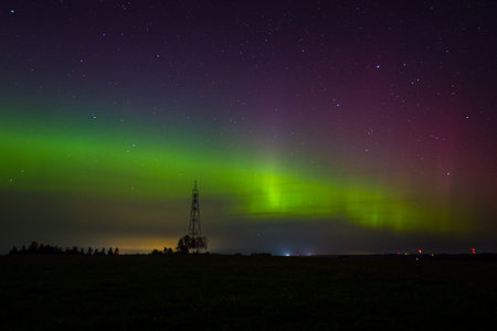 Aurora borealis, northern light in the sky at nightの写真素材