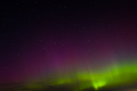 Northern lights (Aurora borealis) over the night skyの写真素材