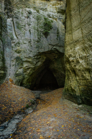 Landscape of a cave in the mountains. The entrance to the cave.の写真素材