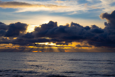 Dramatic cloudscape over the sea at sunset. Nature composition.の写真素材