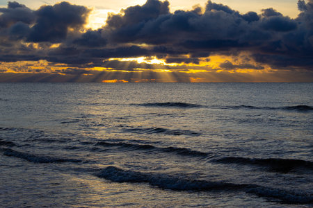 Sunset on the Baltic Sea in Poland. Dramatic sunset over the sea.の写真素材
