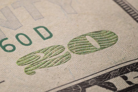 Close up of one hundred dollar banknote. Shallow depth of fieldの写真素材
