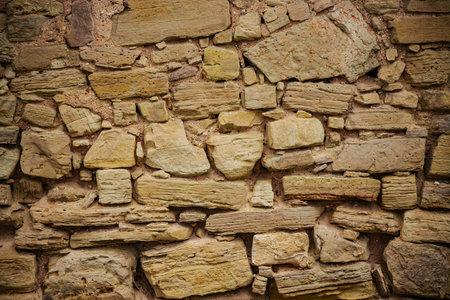 Background of stone wall texture. Old stone wall texture for design.の写真素材
