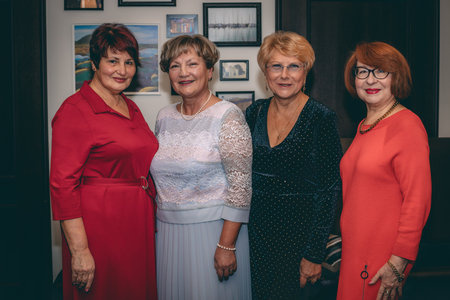 Portrait of a group of senior women standing in a row.の写真素材