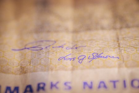 Close up of a passport with visa stamps, focus on the passportの写真素材