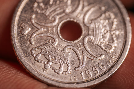 Close up view of a British pound coin. Macro shot with shallow depth of field.の写真素材
