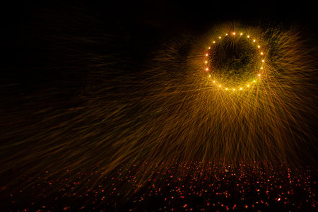 Abstract background of sparks and firework in the form of a circle