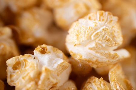 close up of popcorn on a white background. Shallow depth of field.の写真素材