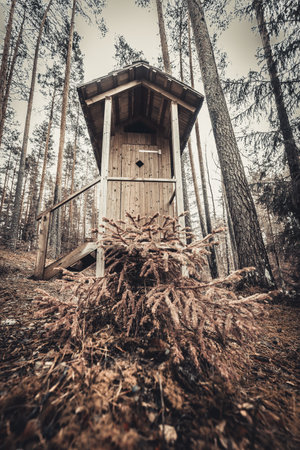 Toilet in the forest. Outdoor toilet wooden structureの写真素材