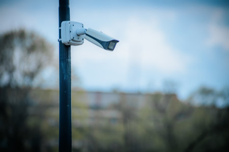 CCTV camera on the street in the city, blurred background.の写真素材