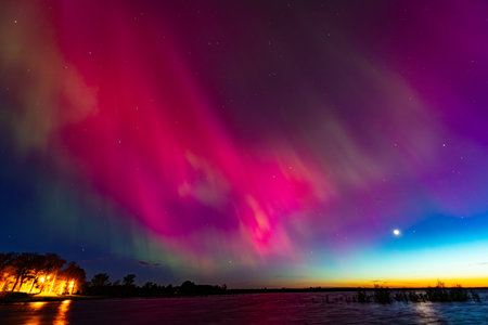 Aurora borealis, northern lights over the lake in Floridaの写真素材