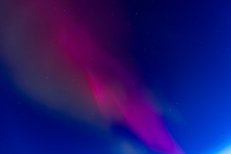 Aurora borealis, northern lights in the night sky.の写真素材