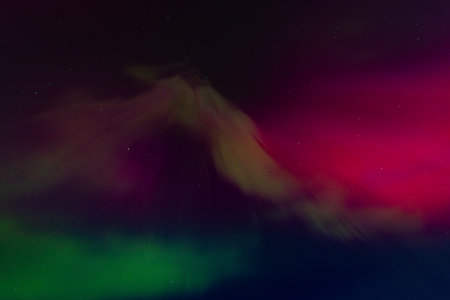 Aurora borealis, northern lights, in the night sky.の写真素材