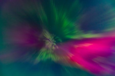 Aurora borealis in the night sky, northern lights.の写真素材