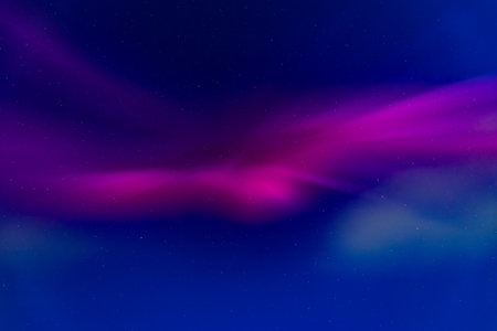 Aurora borealis in the night sky, northern lights.の写真素材