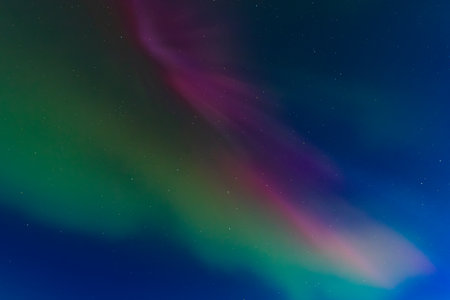 Aurora borealis, northern lights in the night sky.の写真素材
