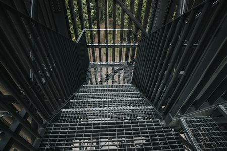 Metal staircase in the park. View from the bottom to the top.の写真素材