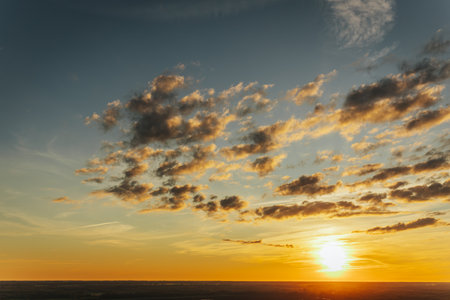 Beautiful sunset over the sea. Colorful sky with clouds.