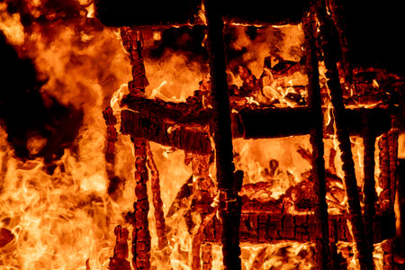 Burning firewood in the fireplace, closeup of photo.の写真素材