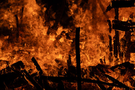 Fire flames on a black background, close-up of fire.の写真素材