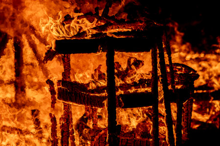 Fire in the house. Fire on a black background. Fire in the house.
