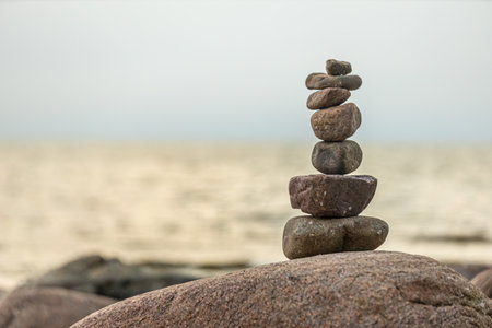 Balanced stones on the beach. Zen concept. Selective focus.の写真素材