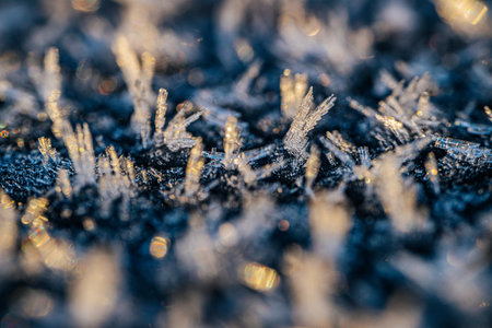 Macro of ice crystals on a frozen window glass. Frosty backgroundの写真素材