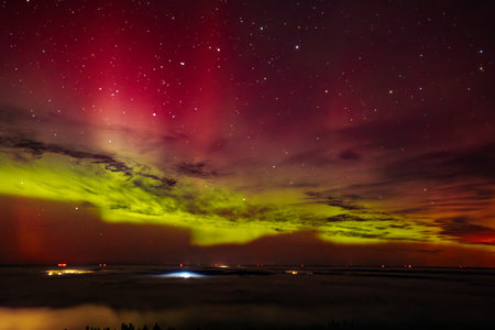 Aurora borealis in the night sky. Northern lights.の写真素材