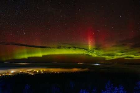 Aurora borealis, northern lights, over the lake.の写真素材