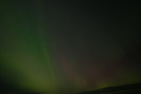 Aurora borealis, northern lights, over the night skyの写真素材