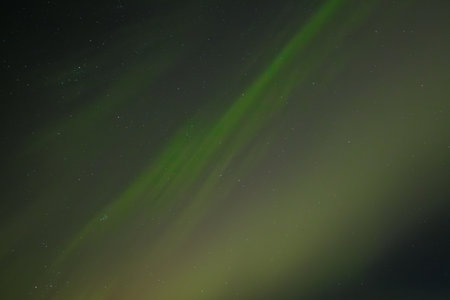 Aurora borealis in the night sky. Northern lights.の写真素材