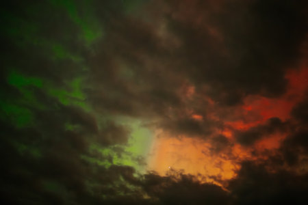 Rainbow in the sky with clouds. Colorful abstract background.の写真素材