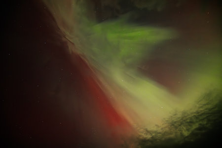 Aurora borealis in the night sky, northern lights.の写真素材