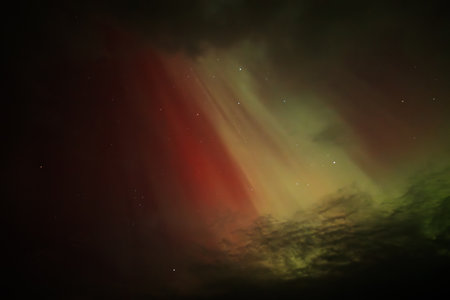 Aurora borealis in the night sky. Northern lights.の写真素材