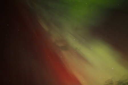 Aurora borealis in the night sky, northern lights.の写真素材