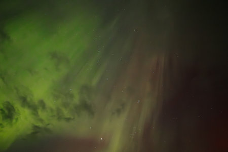 Aurora borealis, northern lights in the night sky.の写真素材