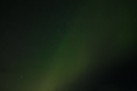 Aurora borealis, northern lights in the night sky.の写真素材