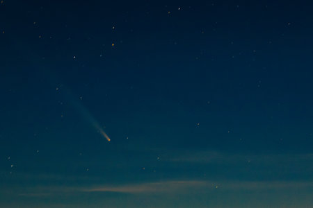 Night sky with stars and a meteorite. Selective focus.の写真素材