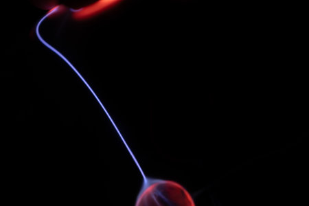 Abstract smoke from incense on a black background. Close-up.