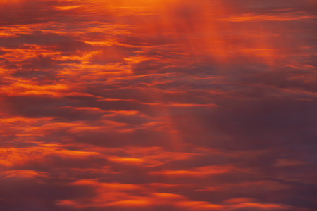 Cloudscape, Colored Clouds at Sunset near the Ocean as a Backgroundの写真素材