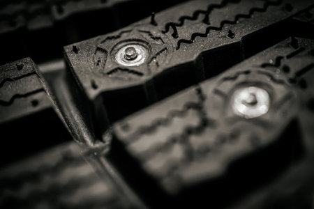 Close up of car tire. Selective focus. Shallow depth of field. Toned.の写真素材