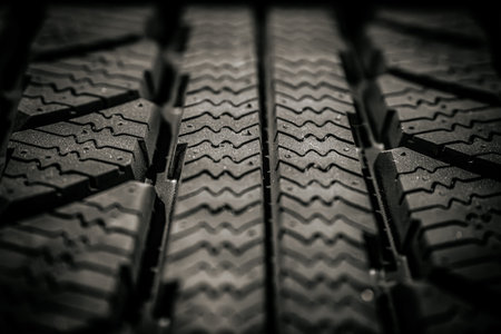 Close up of car tire texture background. Black and white image.の写真素材